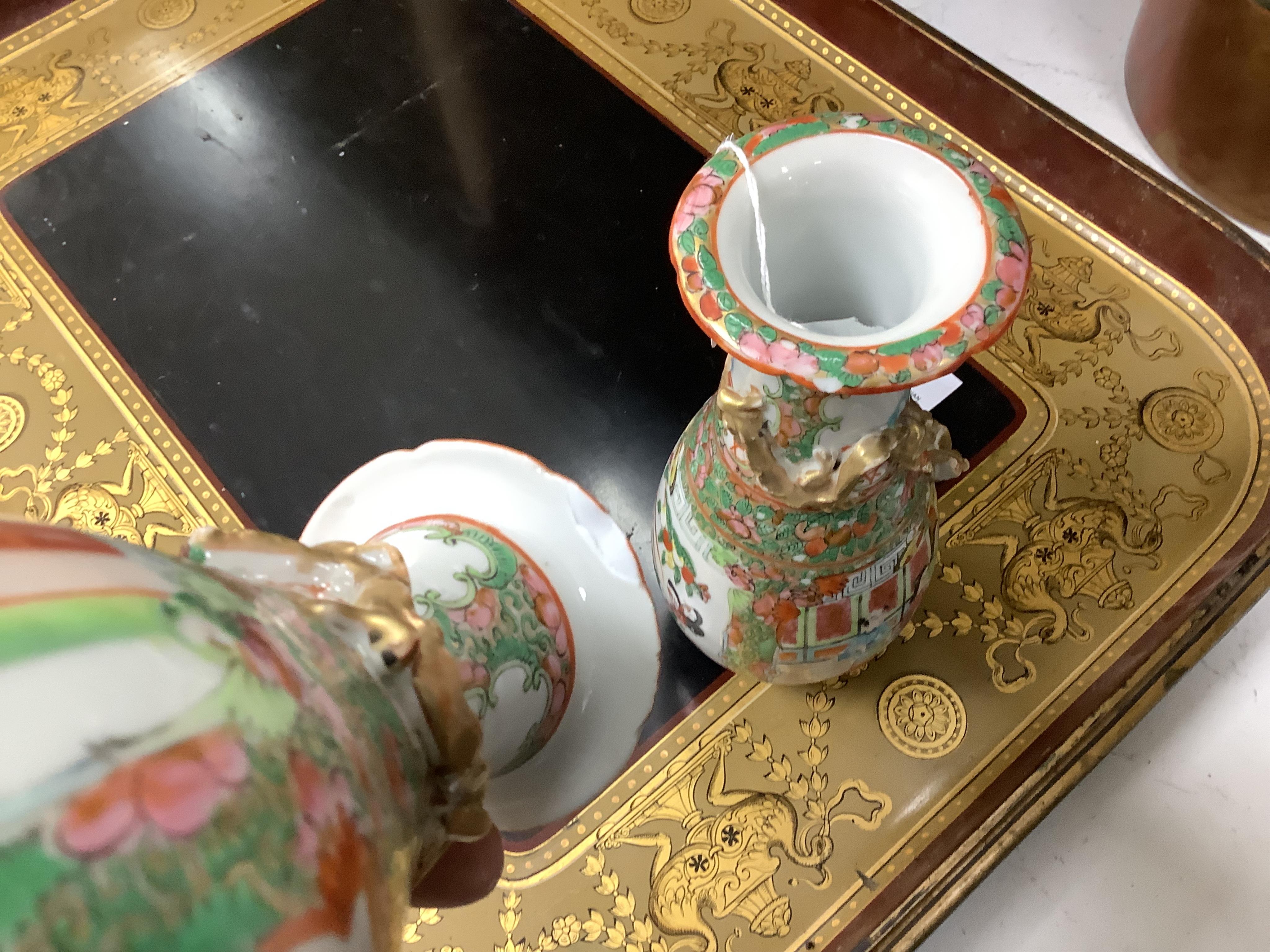 A pair of late 19th century Chinese famille rose porcelain vases, 20cm high